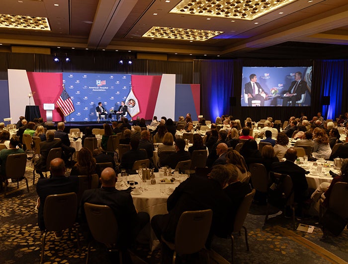 People in a conference room at the AHA Annual Meeting