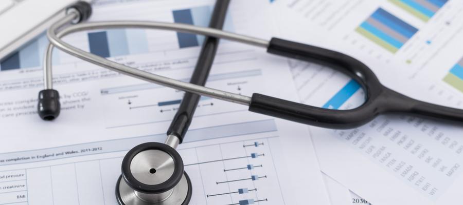 Stethoscope resting on forms